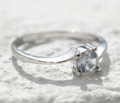 Ceylon White Sapphire set on 18K White Gold Clovehitch Ring
