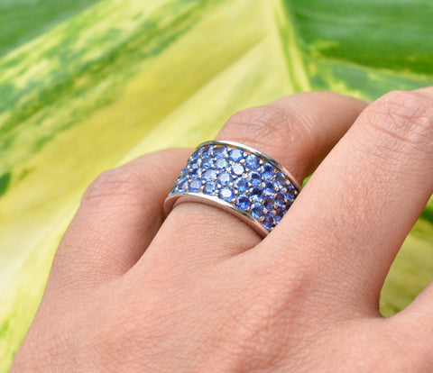 Blue sapphire ring or a thick wedding band made with 18K white gold