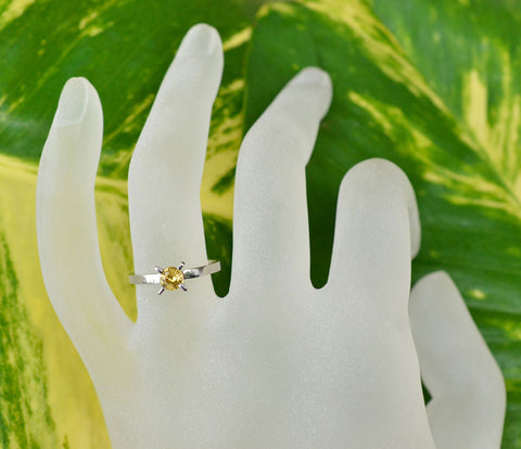 Solitaire yellow sapphire ring in white gold prong setting