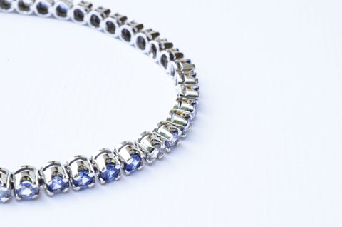 Blue and white sapphire bracelet set in 18K white gold