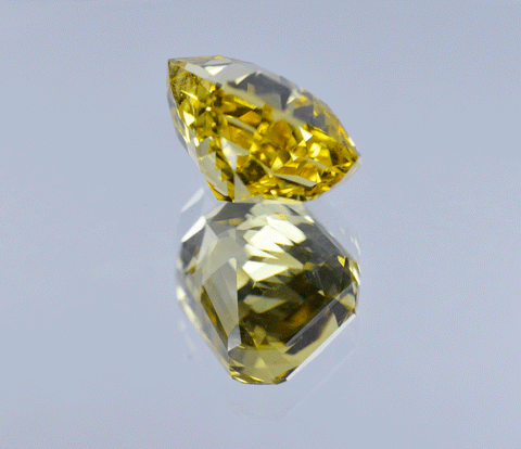 13mm vivid yellow sapphire gemstone from Ceylon