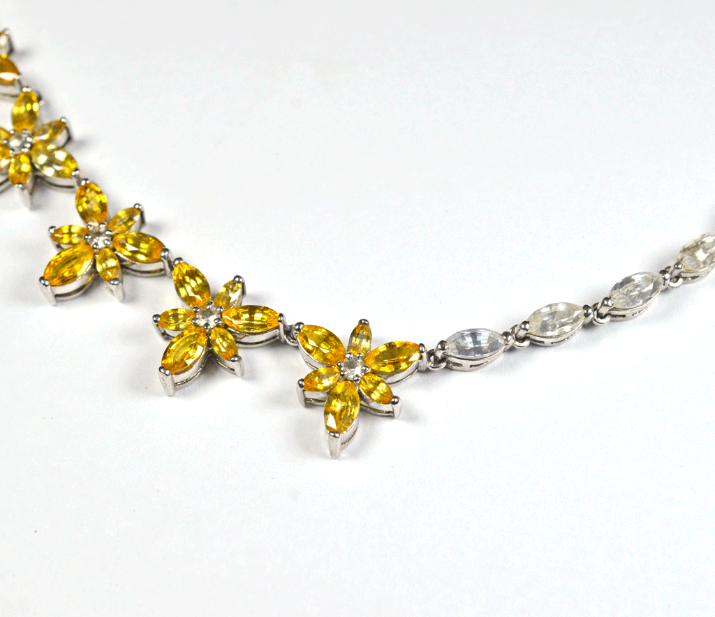 Rubans Rhodium Plated Yellow Sapphire Zircons Studded Necklace Set.