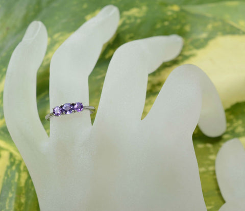 3 Natural Ceylon Purple Sapphires prong set on 18K white gold ring available to buy at Elizabeth Jewellers in Sri Lanka