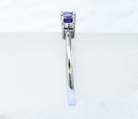 3 Natural Ceylon Purple Sapphires prong set on 18K white gold ring available to buy at Elizabeth Jewellers in Sri Lanka