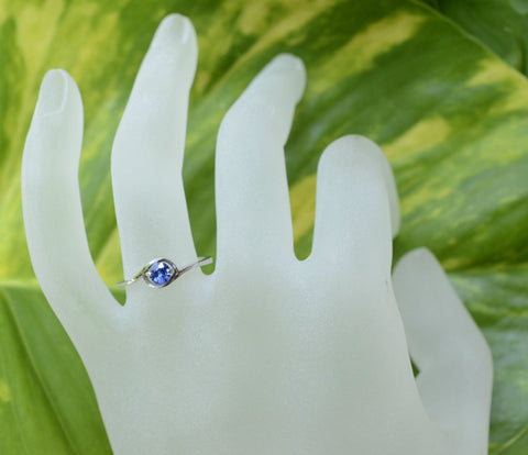 Round Ceylon Blue Sapphire in 18K White Gold Swirl perfect for an engagement ring
