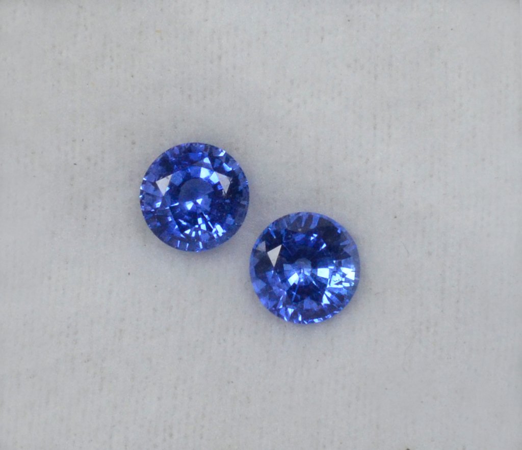 Pair of round blue sapphire gemstones